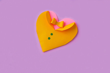 DIY holiday cards made of colored paper, a heart as a gift for Valentine's Day