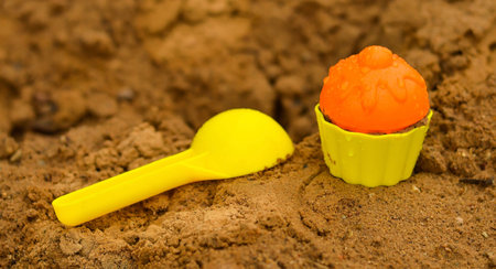 Children toys in a sandbox bucket scoop rakeの写真素材