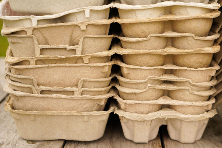 Recycling concept. Cardboard boxes for packaging eggs, eco friendly packaging made of recyclable raw materialsの写真素材