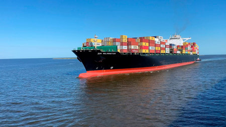 Galveston - April 12, 2023: large container ship ZIM WILMINGTON arriving to the container terminal....