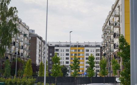 New modern block of flats in green area. residential apartment with flat buildings exterior. luxury house complex. Part of City Real estate property, condo architecture. apartment insurance concept.の写真素材