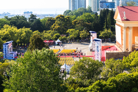 people wait for movie stars along the red carpet of Sochi Winter theater, the venue of cinema festival Kinotavrのeditorial素材