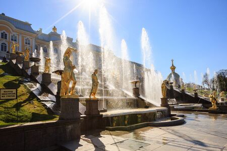 Grand Peterhof Palace, Grand Cascade, largest fountain ensemble, jets lit by sunのeditorial素材