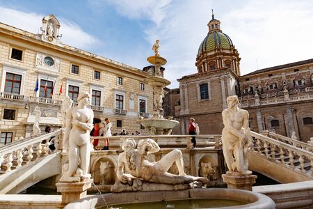 Palermo, Italy - May 9, 2019: magnificent front view of Praetorian fountain with monuments in Piazza Pretoria, sunny day. City government residence building, Church of San Giuseppe dei Teatiniのeditorial素材