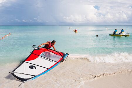 Happy tourists kayaking in the transparent water of Caribbean, Varadero, Cubaのeditorial素材