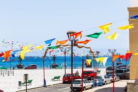 Candelaria, Tenerife, Spain - August 09, 2013: traditional Canary landscape, square near Basilica and Royal Marian Shrine of Our Lady of the Candelaria with sea view, bright summer dayのeditorial素材
