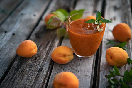 Blended Colorful Apricot Sugar Free Smoothie with Chia Seeds and Mintの写真素材