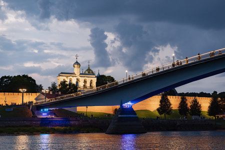 night view of the Novgorod Kremlin, pedestrian bridge over the Volkhov River