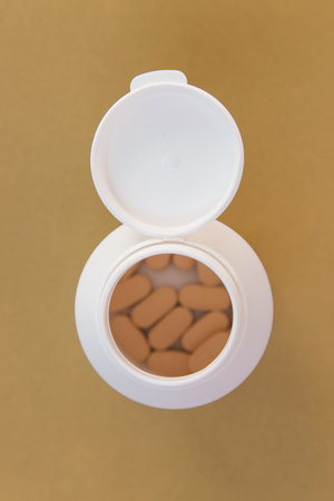 Pills in white background. Top view. Flat lay.の写真素材