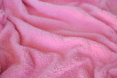 Texture fabric of pink color. Textile cloth background.の写真素材