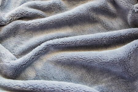 Texture fabric. Textile warm grey knitted cloth background.の写真素材
