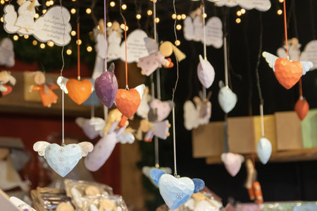 Christmas decorations with glass, angel, heart baubles colorful balls inside snow.の写真素材