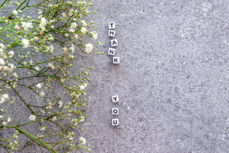 Thank you exclamation word on the stone background. Words for gratitude.の写真素材
