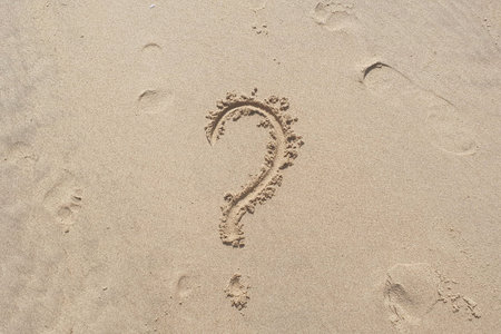 Question word exclamation word on sea sand background. Beautiful ocean beach for walking way.の写真素材