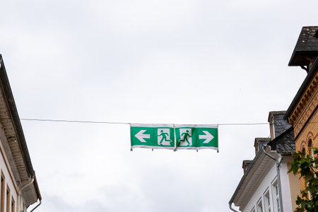 Exit sign on the street. Emergency information sign in big city.の写真素材