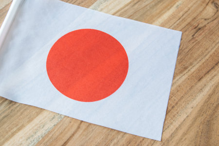 Flag of Japan on the natural wood background.の写真素材