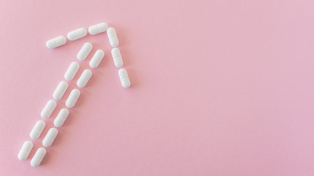 Much medical tablets on the pink background. Healthcare concept. Space for text.の写真素材