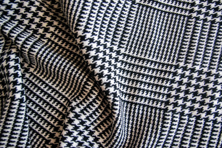 Cotton black and white textile cloth background in summer day for fashion clothing.