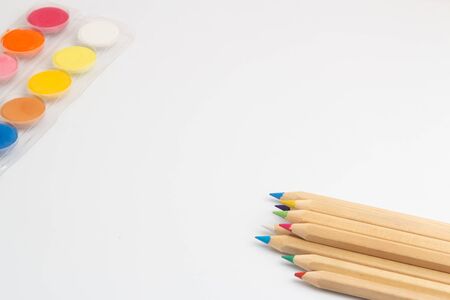 Colored pencils and pastels on a white background. Drawing at schoolの写真素材