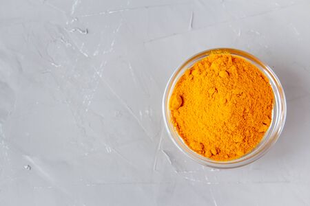 Ground turmeric closeup, top viewの写真素材