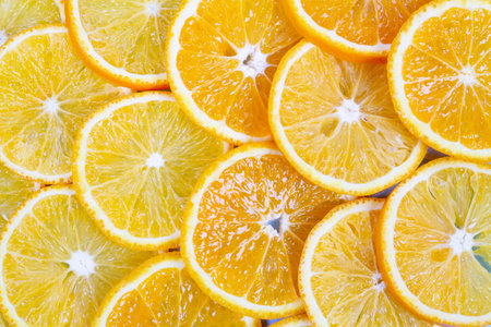 Texture of cut oranges close-up. View from above. Juicy orange