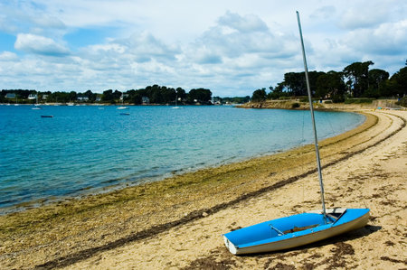 Landscape with bay and sailboat 