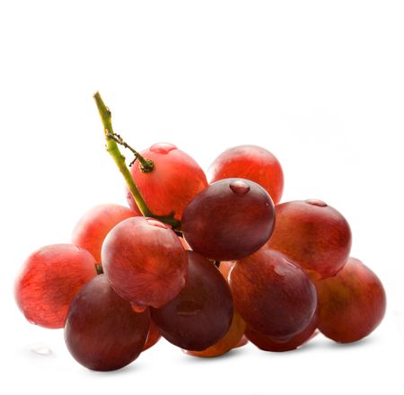 Fresh red grape isolated on whiteの写真素材