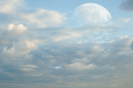 Fantasy Landscape. Super Moon behind blue pink clouds の写真素材