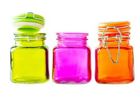 Multicolor glass jars on whiteの写真素材