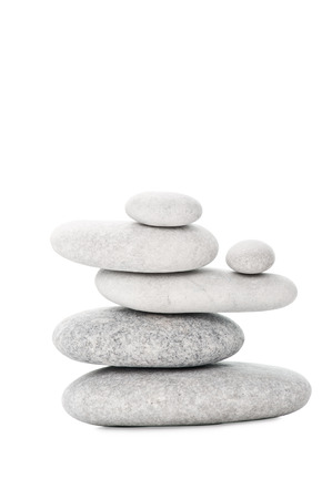 Pile of sea stones on white backgroundの写真素材
