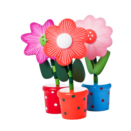 Three floppy Wooden Flower Toys isolated on whiteの写真素材