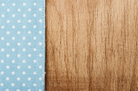 Background from tablecloth and wooden table. Vintage styleの写真素材