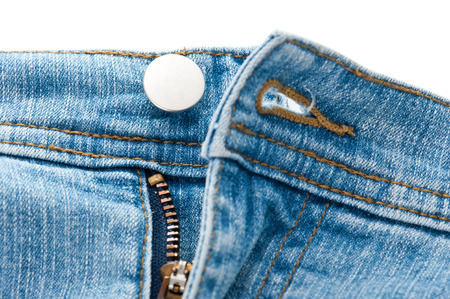 Closeup of blue denim jeans zipperの写真素材