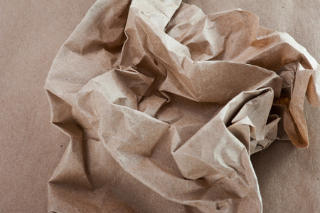 Shabby, crumpled craft paper background texture の写真素材