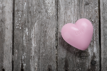 Pink Soap Heart on wooden background. Sign Loveの写真素材