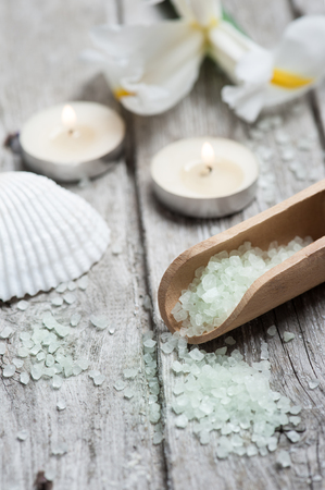 SPA still life, Bath Salt closeup with lit candles on wooden backgroundの写真素材