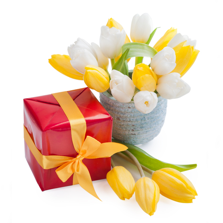 Red box present gift with yellow ribbon bow for Valentine, Easter, birthday or Mothers Day giftの写真素材
