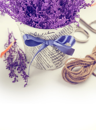 Twine and purple branches in the pot. Gardening decoration. Vintage Toned Imageの写真素材