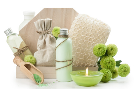 SPA still life, bath products, lit candles, wooden background, greenの写真素材