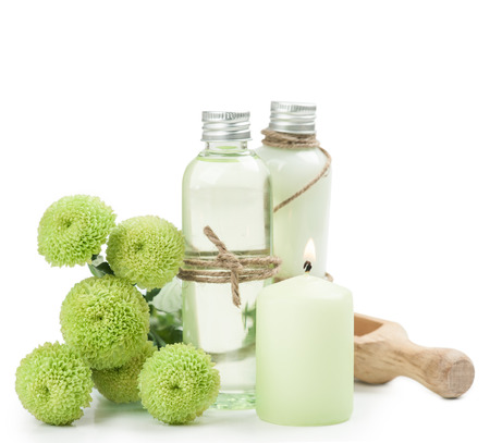 SPA still life, bath products, lit candles, wooden background, greenの写真素材