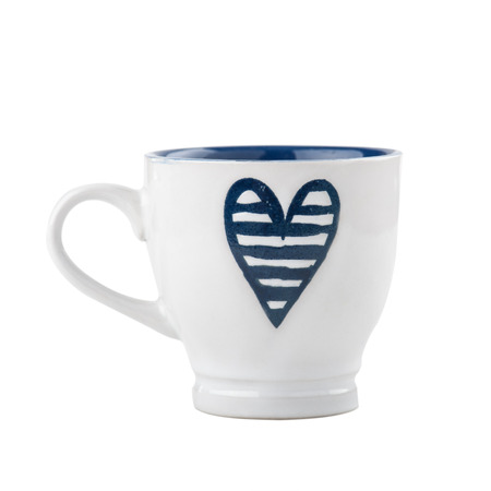 Small white coffee cup with navy blue heart isolated on white. Nautical styleの写真素材