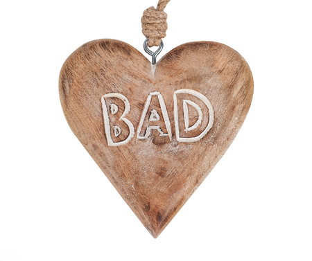 Wooden heart with text BAD, isolated on whiteの写真素材