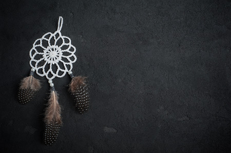Dream catcher on a black background. Space for text. Copyspace.の写真素材