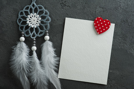 White empty card on concrete wall with christmas decorations. Space for greeting text.の写真素材