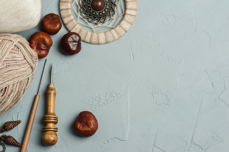 Tools for handmade, yarn, dream catcher on grey concrete backgroundの写真素材