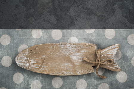 Vintage rustic table setting with empty wooden plate, on linen napkin country style.の写真素材
