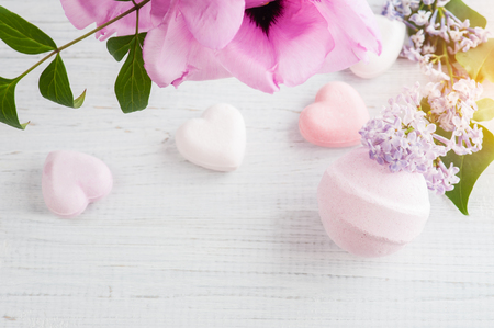 SPA still life, pink bath bombs on white wooden backgroundの写真素材