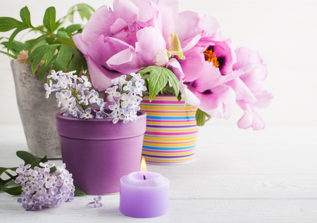 Peonies and lilac flowers. Background with copy space for holiday.の写真素材