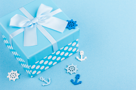 Blue nautical decor, gift box on blue backgroundの写真素材