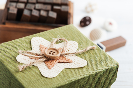 Scrapbooking DIY decor, buttons, stationery. Green gift box. Children backgroundの写真素材